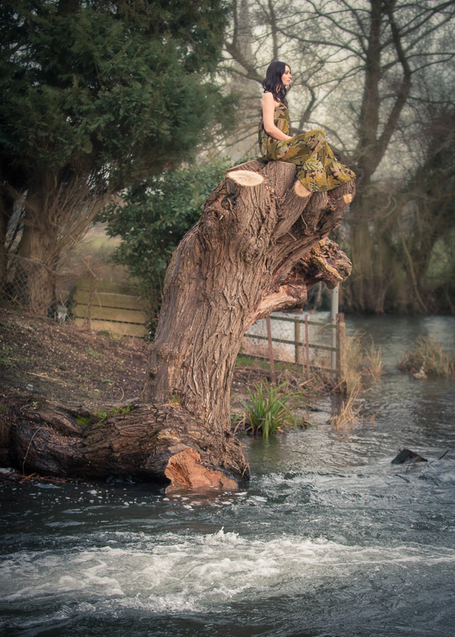 Girl on the tree stump. Old Mill, Harnam